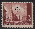 Colored dot in the center of the stamp