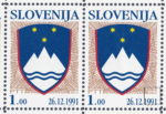 Slovenia, postage stamp error: Blue dot next to the second numeral 1 in 1991 and another blue dot below letter D in DELO