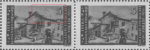 Slovene Littoral postage stamp flaw Multiple colored spots above the roof and below the denomination number.