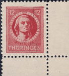 Germany Thueringen post stamp flaw: Long thin scratch below the right denomination value, white line on the lower part of the letter G in THUERINGEN