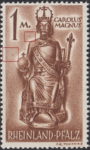 Germany Rheinland-Pfalz postage stamp error:  Colored dots above the left shoulder and around Globus cruciger.