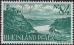 Germany Rheinland-Pfalz postage stamp error:  Colored dot in the cloud next to the castle.