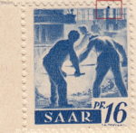 Germany SAAR postage stamp error: Big colored spot on the right side of the top frame.