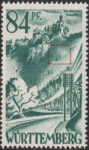 Germany Wuerttemberg postage stamp error: Thin horizontal line and a whitening above the second fir tree below the castle.