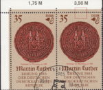GDR 1982 Martin Luther postage stamp plate flaw Thin vertical red line on top of the stamp.