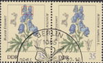GDR 1982 flowers Aconitum Nappelus postage stamp plate flaw Top outline of flower stem missing.