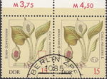 GDR 1982 Posionous Plants Calla Palustris postage stamp plate flaw Red dot between the right leaf and right frame.