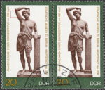 GDR 1983 Amazon statue postage stamp plate flaw Colored dot below Amazon’s left elbow.