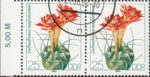 GDR 1983 Cactus plant Submatucana madisoniorum postage stamp plate flaw Spine below the left flower broken.
