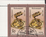 GDR 1983 Sand Glasses and Sundials postage stamp plate flaw Tiny colored spot on the right side of the sundial.