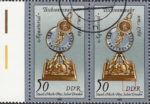 GDR 1983 Sand Glasses and Sundials postage stamp plate flaw White spot above first letter D of DDR.
