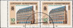GDR 1983 Leipzig Autumn Fair postage stamp plate flaw Horizontal line on facade broken between the 4th windows from the left of the first and second floor.