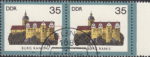 GDR 1984 Castles Burg Ranis postage stamp plate flaw Gray blue colored spot above tree tops to the right from the castle.