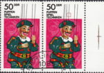 GDR 1984 Marionette postage stamp plate flaw Small thickening on the fourth string.