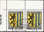 GDR 1984 Coat of Arms Leipzig postage stamp plate flaw Small whitening on the second vertical blue line.