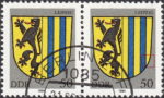 GDR 1984 Coat of Arms Leipzig postage stamp plate flaw Minuscule indentation on inner lower right frame of coat of arms.