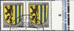 GDR 1984 Coat of Arms Leipzig postage stamp plate flaw White spots on the upper part of the second vertical blue line.