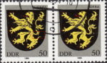 GDR 1984 Coat of Arms Gera postage stamp plate flaw White dot below lion’s tail.
