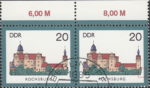 GDR 1985 Castle Rochsburg postage stamp plate flaw Colored dot between the forest and the right frame.