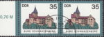 GDR 1985 Castle Burg Schwarzenberg postage stamp plate flaw Scratches on gutter of the roof in the center.