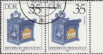 GDR 1985 Antique Mailboxes postage stamp plate flaw Long white line on the side pale blue ornament.
