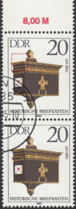 GDR 1985 Antique Mailboxes postage stamp plate flaw Tiny spot on top left of the mailbox.
