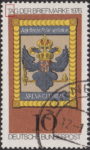Germany stamp plate flaw Colored dot above letter T in TAG.