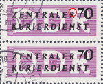 GDR official stamp error: Damaged R