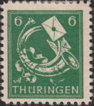 Germany Thuringia post stamp flaw: curved line on top of the upper letter