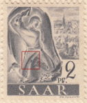 Germany SAAR postage stamp error: Big colored spot on miner’s left leg.