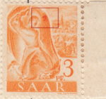 Germany SAAR postage stamp error: Colored spot on the right wall of the mine.
