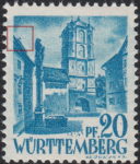 Germany Wuerttemberg postage stamp error: Colored dot above the roof of the left building.