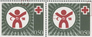 Yugoslavia 1977 Red Cross stamp error Red dot between the left hand and Red Crescent emblem